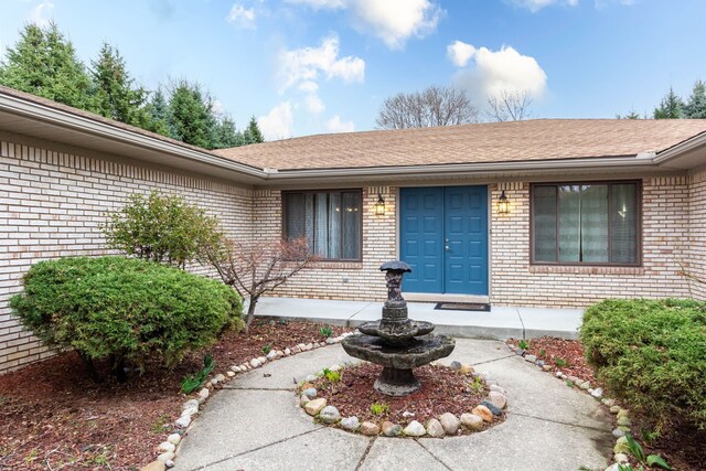 46498 Houghton Dr, Shelby, MI 48315 - entrance to property with brick siding