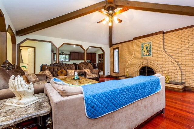 46498 Houghton Dr, Shelby, MI 48315 - living room featuring brick wall, wood finished floors, ceiling fan, and lofted ceiling with beams