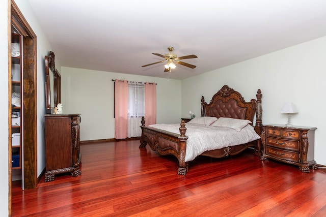 46498 Houghton Dr, Shelby, MI 48315 - bedroom featuring ceiling fan, baseboards, and wood finished floors
