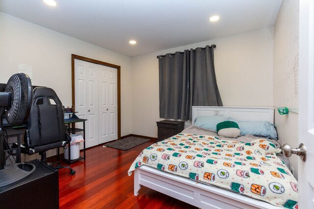 46498 Houghton Dr, Shelby, MI 48315 - bedroom with a closet, baseboards, recessed lighting, and dark wood finished floors