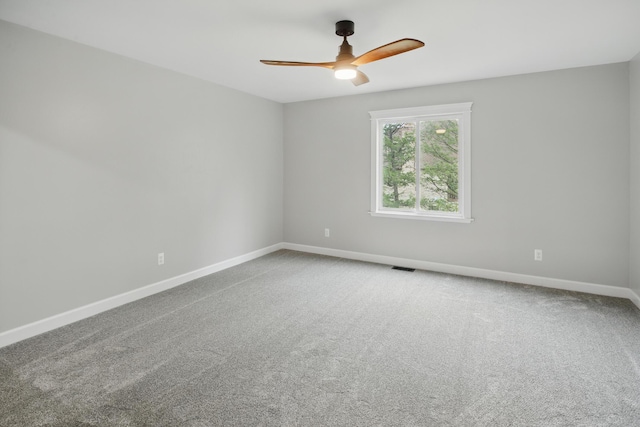 4489 Cranbrook Trl, Orchard Lake, MI 48323 - carpeted spare room featuring ceiling fan, baseboards, and visible vents