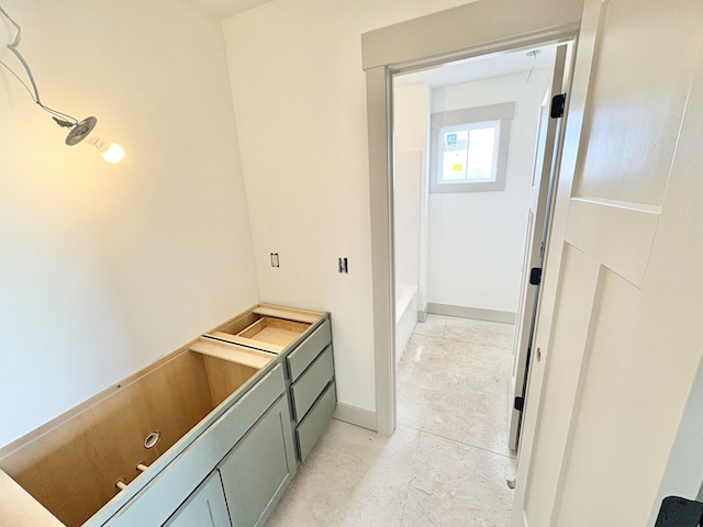 8284 Kettle Oak Dr, Alto, MI 49302 - full bathroom with a bath and baseboards