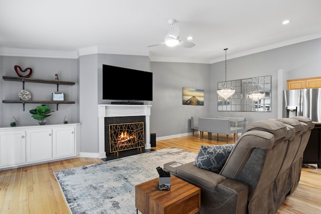 22068 Edgewater, Novi, MI 48375 - living area with ceiling fan, crown molding, a fireplace, light wood-style floors, and recessed lighting