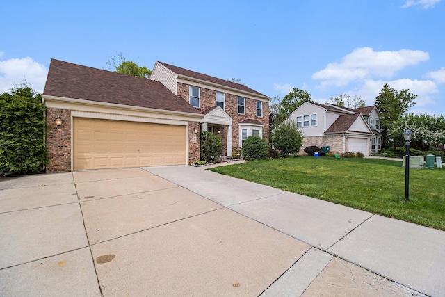 view of front of house with brick siding, driveway, a front yard, and an attached garage