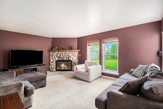 living room with carpet floors and a fireplace