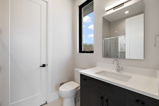 49351 Villa Dr, Novi, MI 48374 - full bathroom featuring a shower stall, toilet, vanity, and baseboards