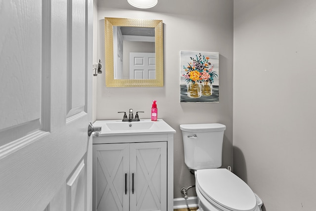 half bath with toilet and vanity