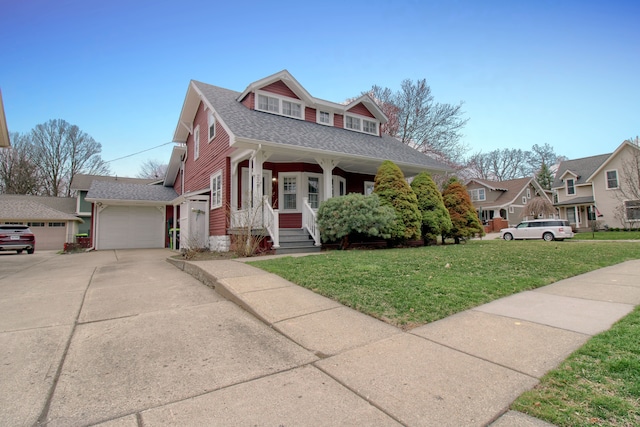 view of front of home with concrete driveway, a residential view, a shingled roof, and a front lawn