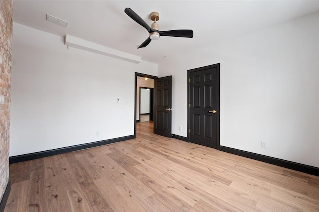 1459 Edison St, Detroit, MI 48206 - spare room featuring light wood-style floors, ceiling fan, baseboards, and visible vents
