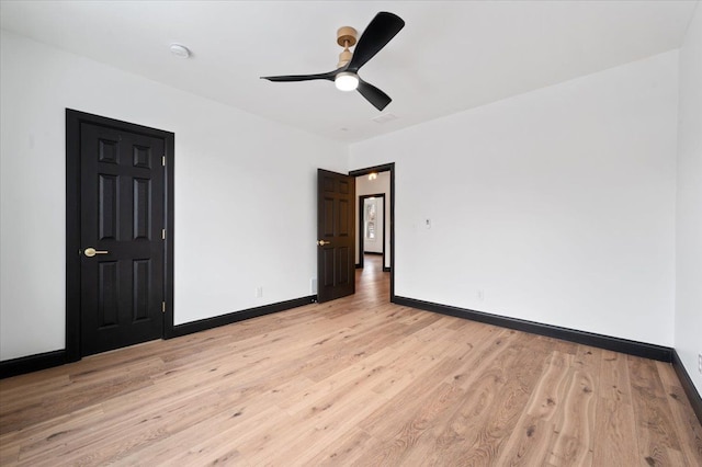 1459 Edison St, Detroit, MI 48206 - spare room with light wood-style floors, ceiling fan, and baseboards
