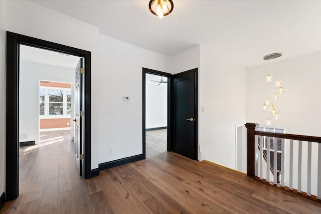 1459 Edison St, Detroit, MI 48206 - unfurnished room with wood-type flooring and baseboards