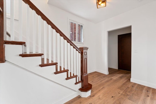 1459 Edison St, Detroit, MI 48206 - staircase featuring wood finished floors and baseboards