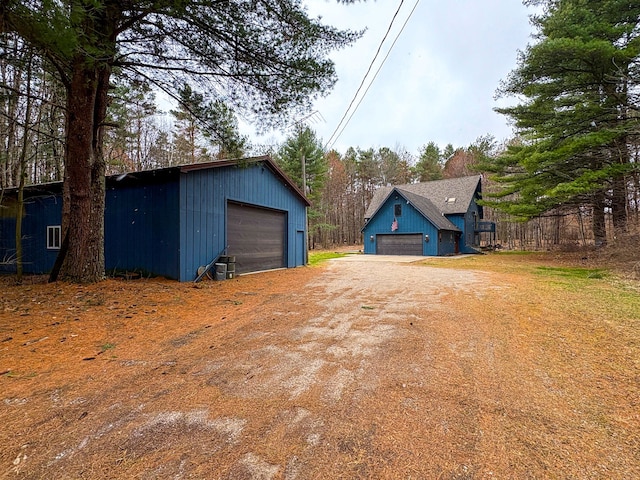 detached garage with fence