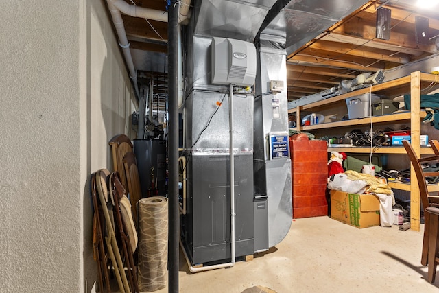 316 Lenox Ln, Brighton, MI 48114 - utility room with heating unit and water heater