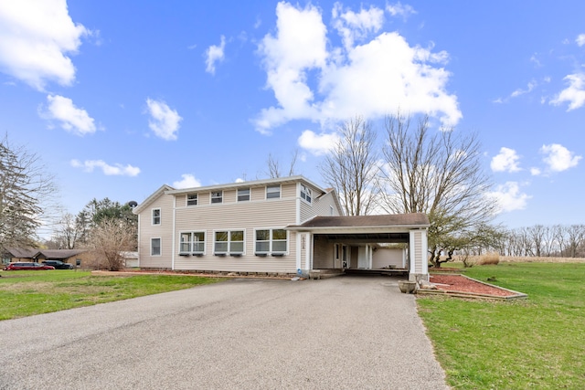 6308 E Becht Rd, Coloma, MI 49038 - view of front of property featuring asphalt driveway, a front yard, and a carport