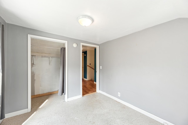 6308 E Becht Rd, Coloma, MI 49038 - unfurnished bedroom with baseboards, a closet, and carpet