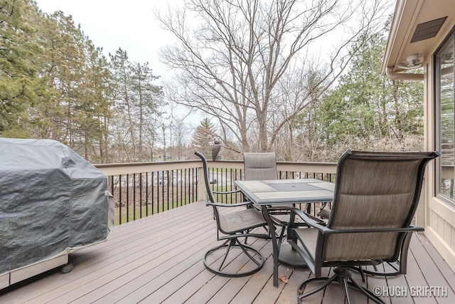 2376 Bob White Ct SE, Grand Rapids, MI 49546 - wooden deck with outdoor dining area and area for grilling