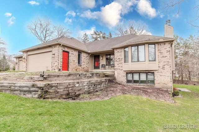 2376 Bob White Ct SE, Grand Rapids, MI 49546 - view of front of property featuring an attached garage, a chimney, a front yard, and brick siding