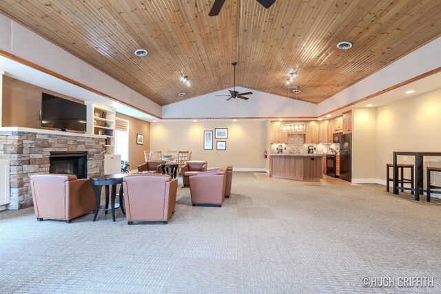 2376 Bob White Ct SE, Grand Rapids, MI 49546 - living room with visible vents, ceiling fan, light colored carpet, and wood ceiling