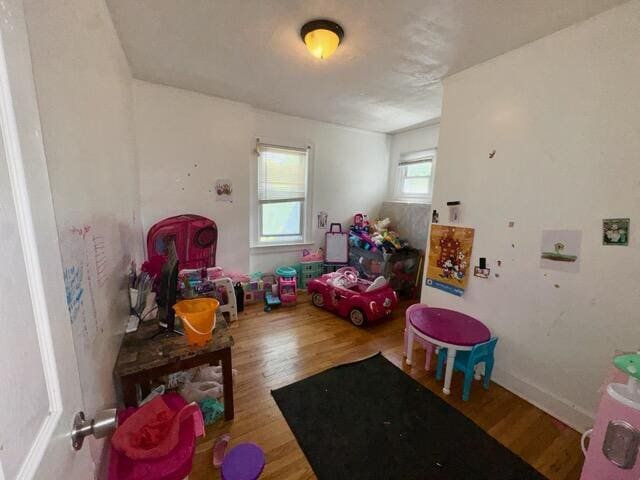 5793 Yorkshire Rd, Detroit, MI 48224 - recreation room featuring wood finished floors