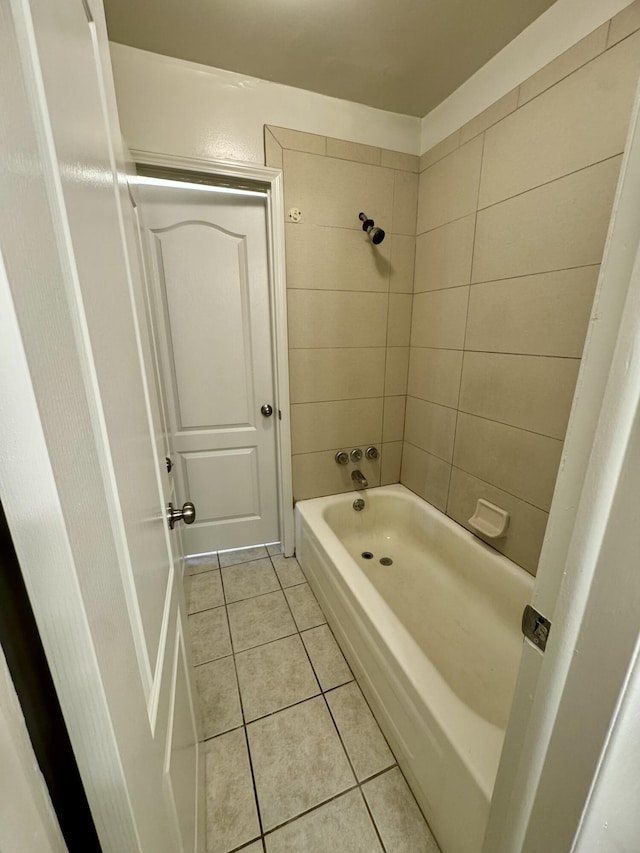bathroom with tile patterned floors and shower / bathing tub combination