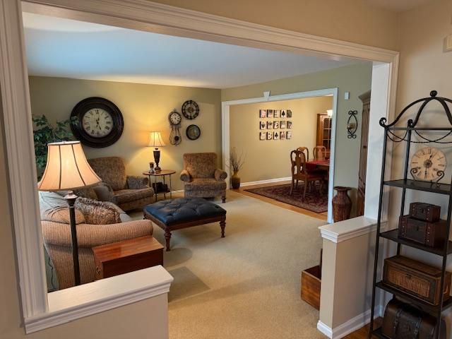 5280 Inverrary Ln, Commerce Twp, MI 48382 - living room featuring carpet floors