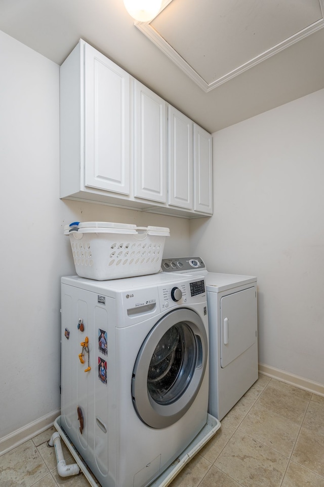 3885 Silver Charm Ln, Howell, MI 48843 - laundry room featuring cabinet space, washing machine and dryer, and baseboards