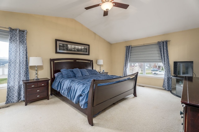 3885 Silver Charm Ln, Howell, MI 48843 - bedroom with light carpet, vaulted ceiling, baseboards, and a ceiling fan