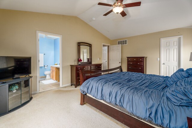 3885 Silver Charm Ln, Howell, MI 48843 - bedroom with light colored carpet, lofted ceiling, ensuite bath, ceiling fan, and baseboards