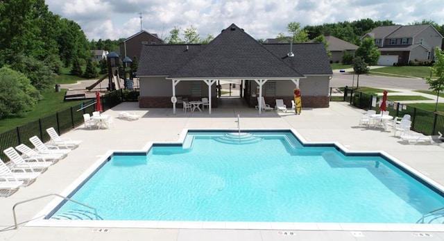 3885 Silver Charm Ln, Howell, MI 48843 - community pool with fence and a patio