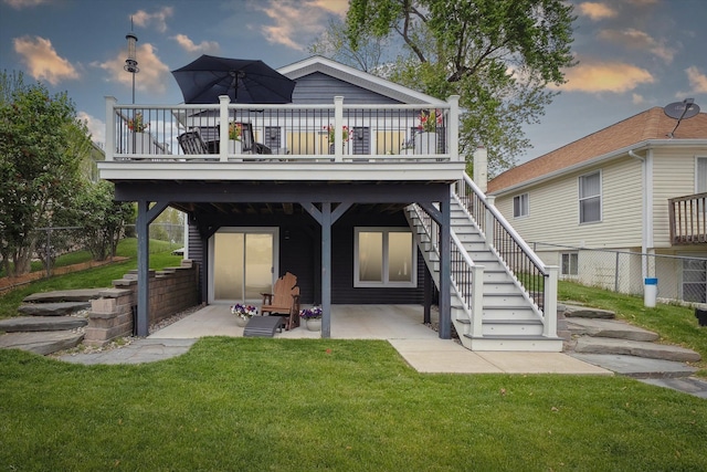 11449 Sunset Blvd, Pinckney, MI 48169 - back of house with a wooden deck, a patio, and stairs