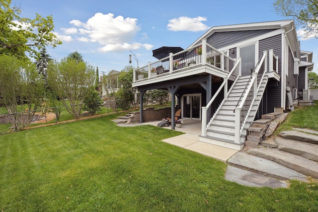 11449 Sunset Blvd, Pinckney, MI 48169 - rear view of house with a deck, a patio area, and stairway
