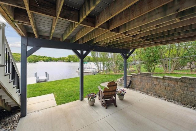 11449 Sunset Blvd, Pinckney, MI 48169 - view of patio featuring a water view and a dock