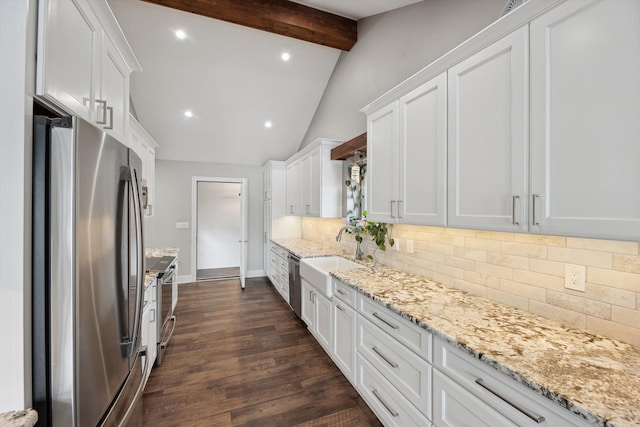 11449 Sunset Blvd, Pinckney, MI 48169 - kitchen featuring appliances with stainless steel finishes, white cabinetry, backsplash, light stone countertops, and recessed lighting