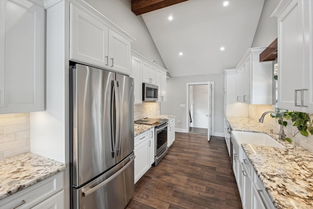 11449 Sunset Blvd, Pinckney, MI 48169 - kitchen featuring stainless steel appliances, decorative backsplash, white cabinetry, recessed lighting, and dark wood finished floors