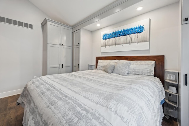 11449 Sunset Blvd, Pinckney, MI 48169 - bedroom with dark wood-style flooring, recessed lighting, and baseboards