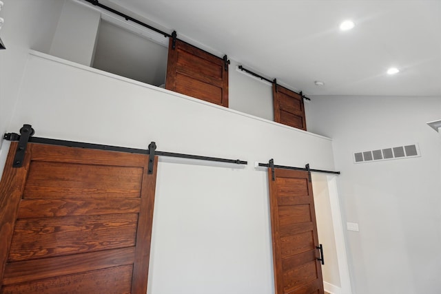 11449 Sunset Blvd, Pinckney, MI 48169 - detailed view of a barn door and recessed lighting
