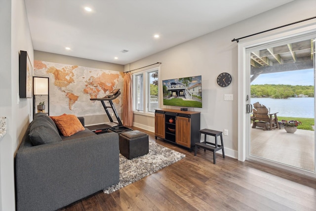 11449 Sunset Blvd, Pinckney, MI 48169 - living area featuring wood finished floors, recessed lighting, and baseboards