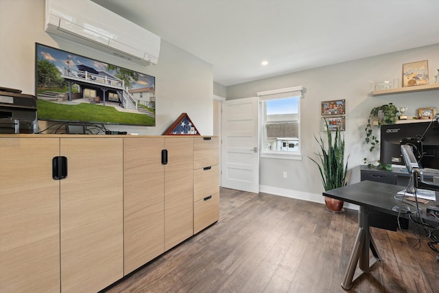11449 Sunset Blvd, Pinckney, MI 48169 - home office featuring a wall mounted air conditioner, wood finished floors, baseboards, and recessed lighting