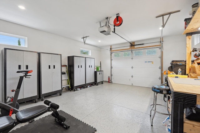 11449 Sunset Blvd, Pinckney, MI 48169 - garage featuring a garage door opener and recessed lighting