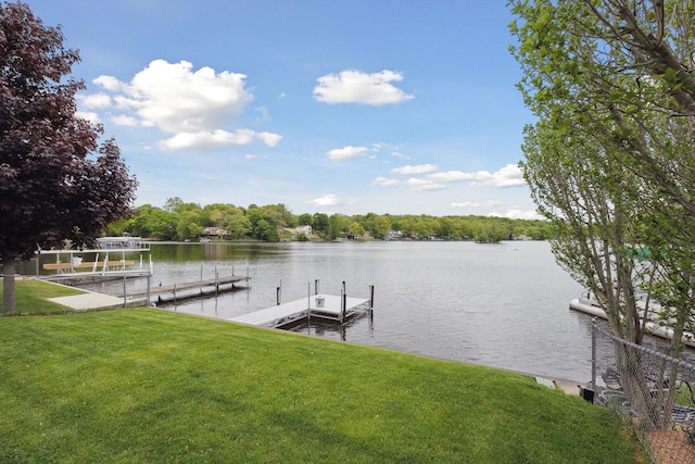 11449 Sunset Blvd, Pinckney, MI 48169 - dock area with a water view and a yard