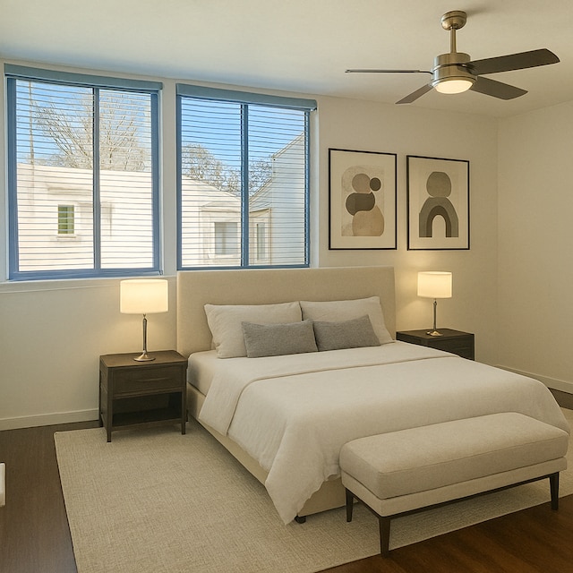 bedroom with baseboards, a ceiling fan, and wood finished floors