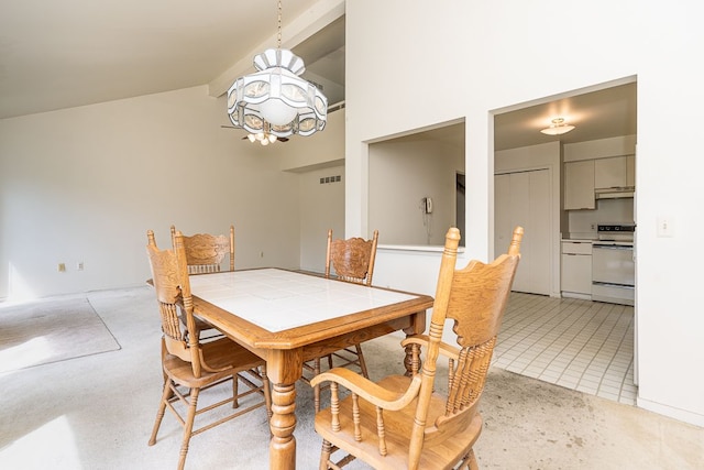 dining area with visible vents, high vaulted ceiling, and an inviting chandelier