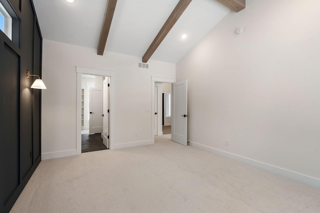 unfurnished bedroom featuring light colored carpet, baseboards, and recessed lighting