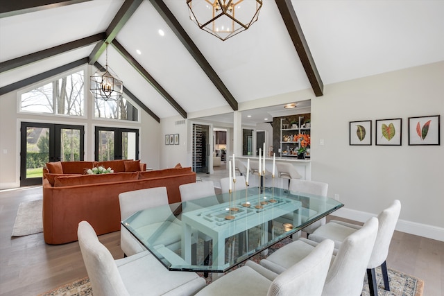 245 Chestnut Cir, Bloomfield Hills, MI 48304 - dining space with a chandelier, beamed ceiling, wood finished floors, high vaulted ceiling, and baseboards