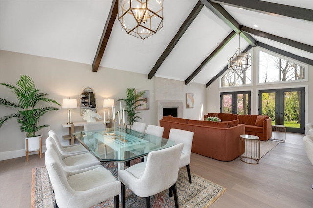 245 Chestnut Cir, Bloomfield Hills, MI 48304 - dining area with a chandelier, high vaulted ceiling, beam ceiling, light wood-type flooring, and french doors