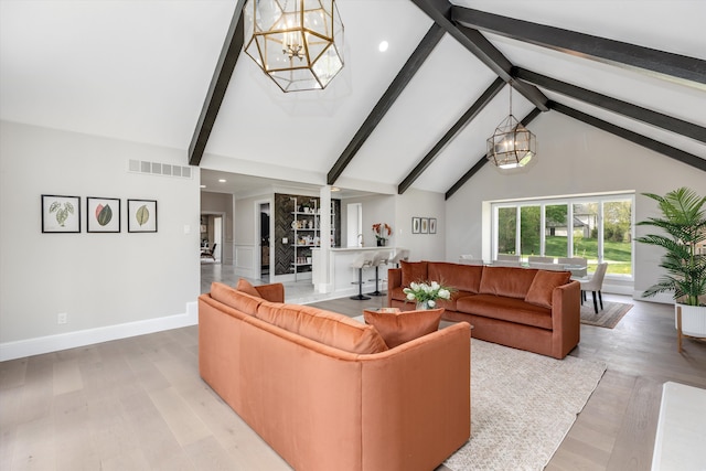 245 Chestnut Cir, Bloomfield Hills, MI 48304 - living room featuring a chandelier, beam ceiling, light wood-type flooring, high vaulted ceiling, and recessed lighting