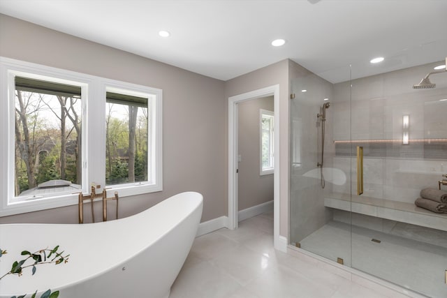 245 Chestnut Cir, Bloomfield Hills, MI 48304 - full bath featuring a shower stall, a freestanding tub, baseboards, and recessed lighting