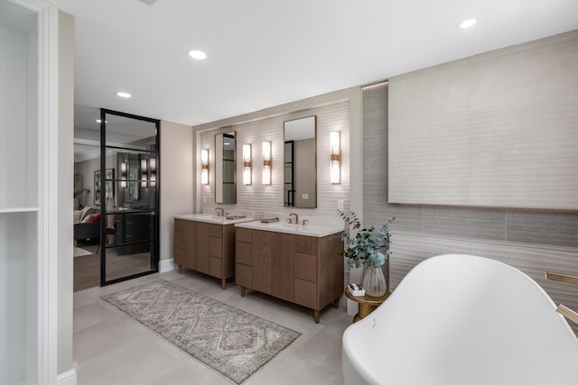 245 Chestnut Cir, Bloomfield Hills, MI 48304 - bathroom with a freestanding tub, vanity, and recessed lighting