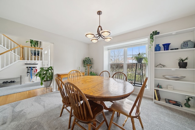 1826 Poppleton Dr, West Bloomfield, MI 48324 - carpeted dining area featuring baseboards, stairway, and an inviting chandelier